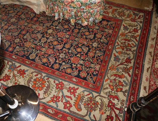A Persian semi-Antique red ground rug